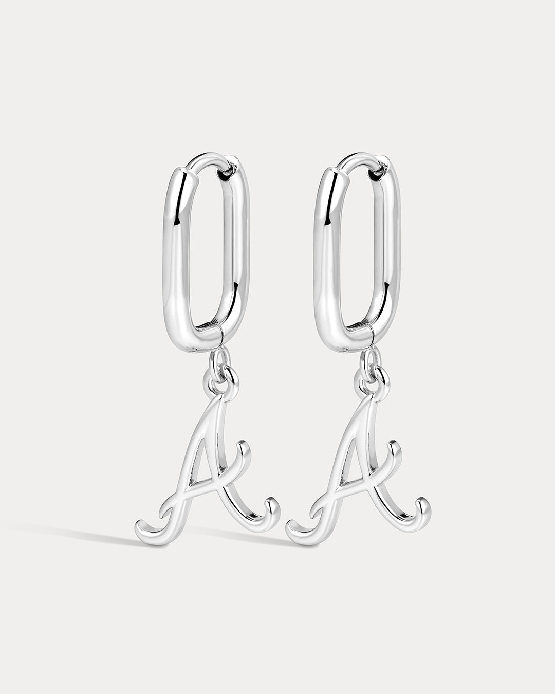 The MLB Logo Charm Oval Hoop Earrings- Silver
